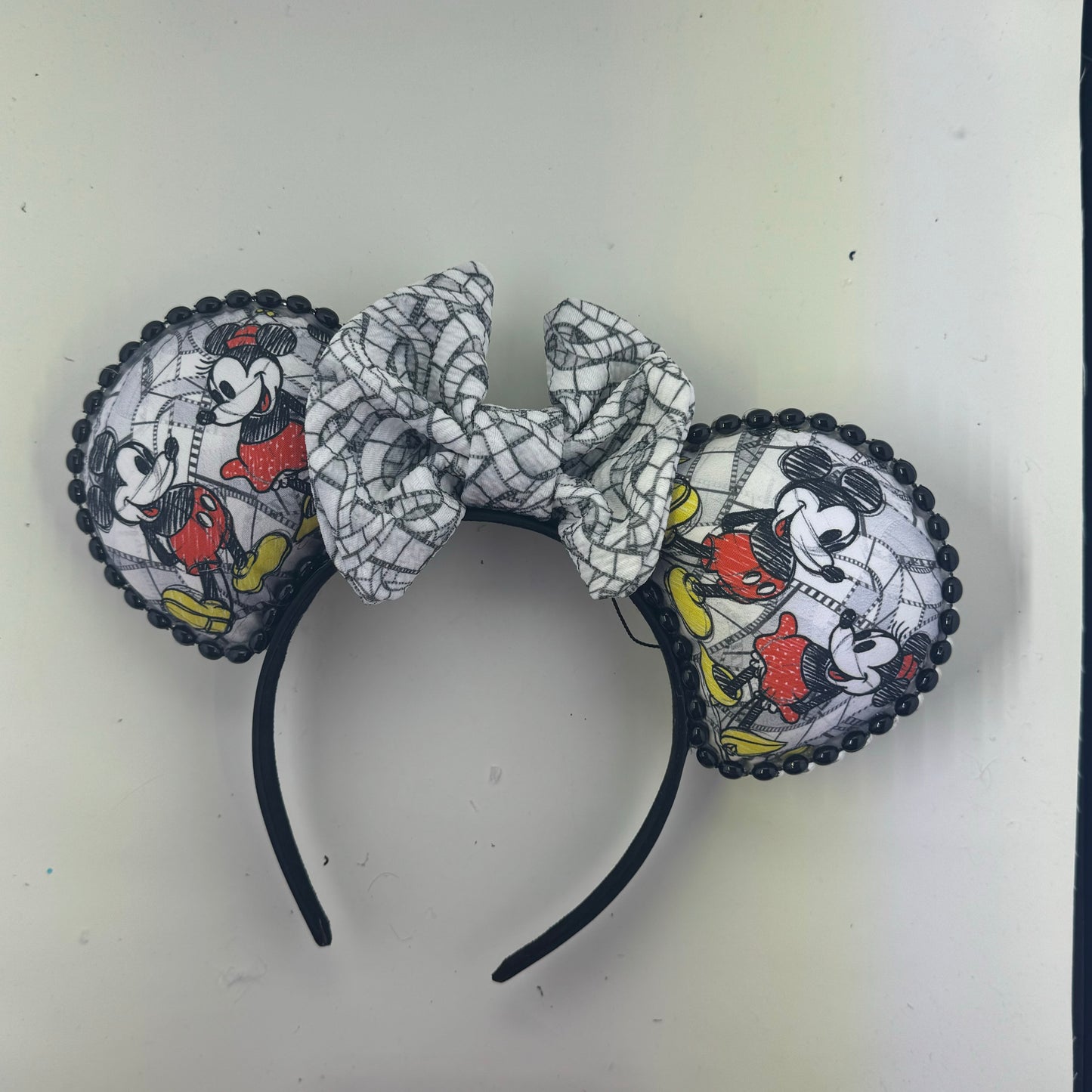 Sketch Mic w/ Film Reel Bow 2 Ears
