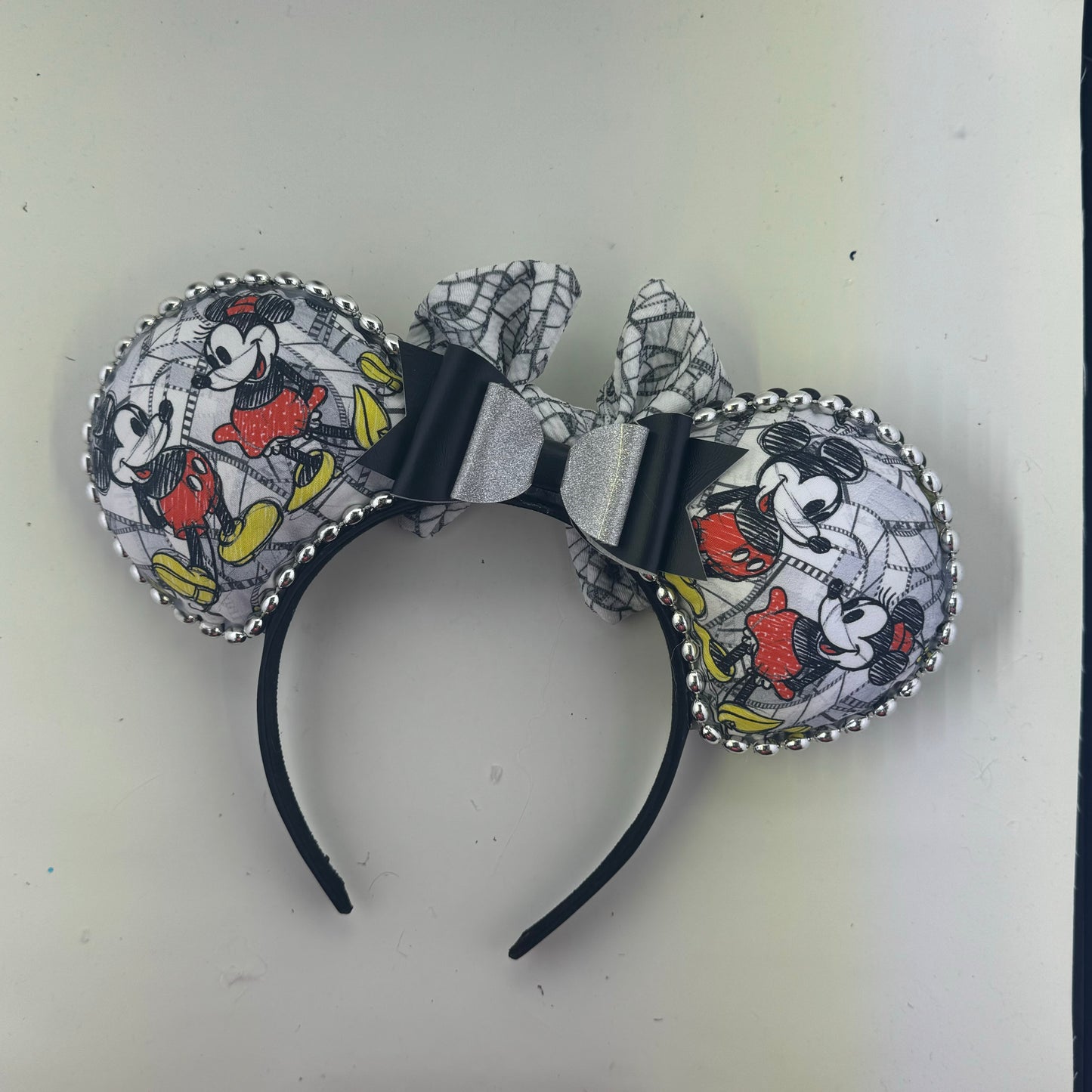 Sketch Mic w/ Film Reel Bow 2 Ears